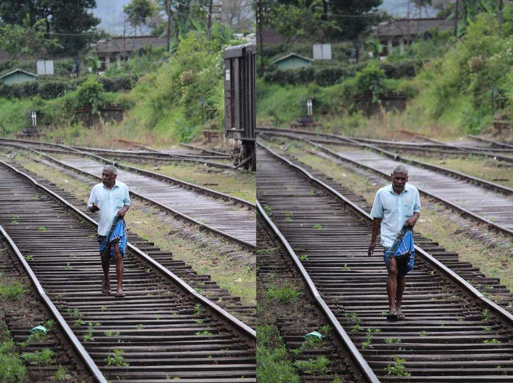 uomo che cammina sui binari a piedi scalzi in Sri Lanka - blog di viaggi